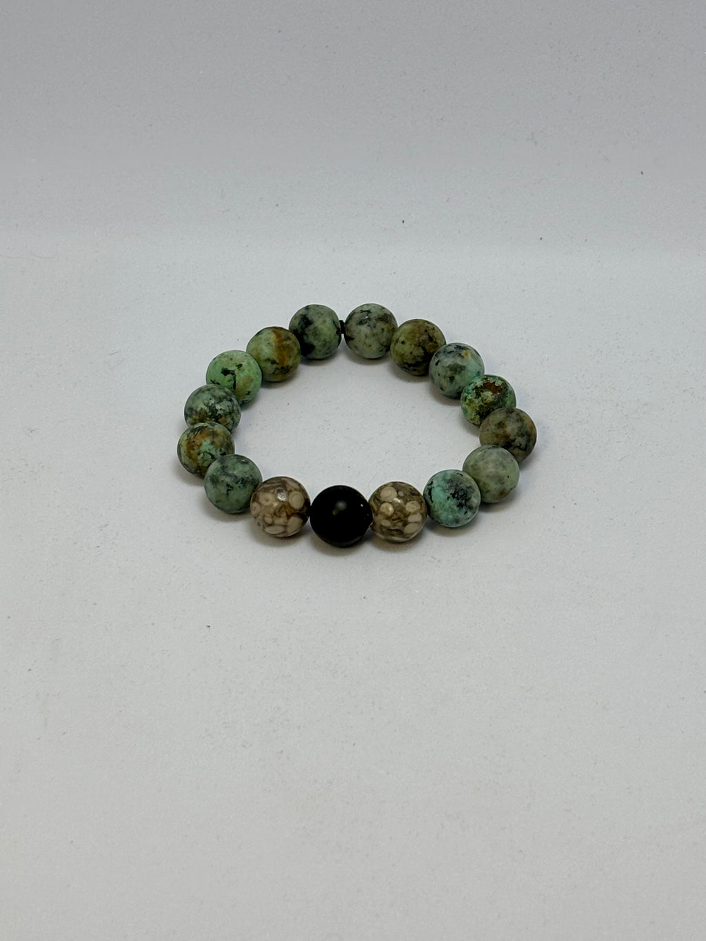 African Turquoise Fossilized Maifanite and Black Onyx bracelet